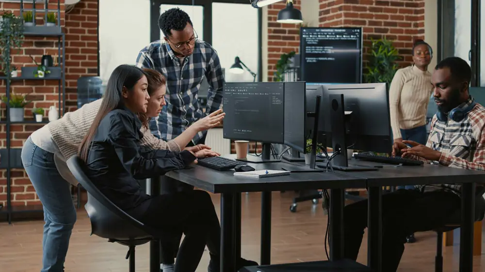 Production team working at their screens